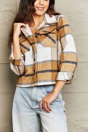 Camel plaid shacket with contrast collar and buttoned chest pockets.