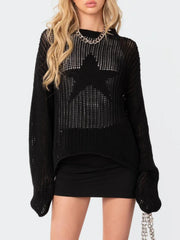 Black open knit sweater with a large star detail, crew neck, and long sleeves.