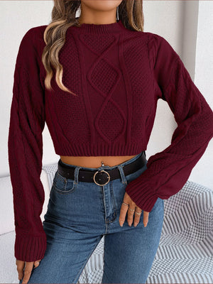 Wine cable knit cropped mock neck sweater with diamond pattern.