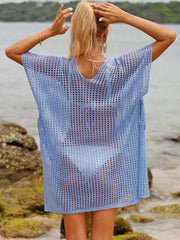 Blue V-neck ruched knit cover-up with short sleeves and drawstring sides.