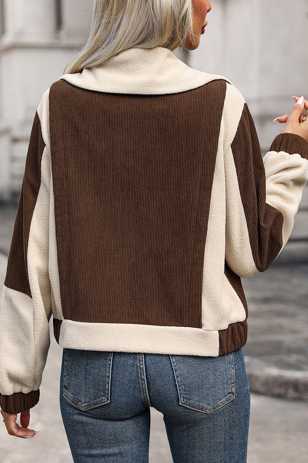 Colorblock corduroy fleece jacket in chocolate and beige with a relaxed fit.