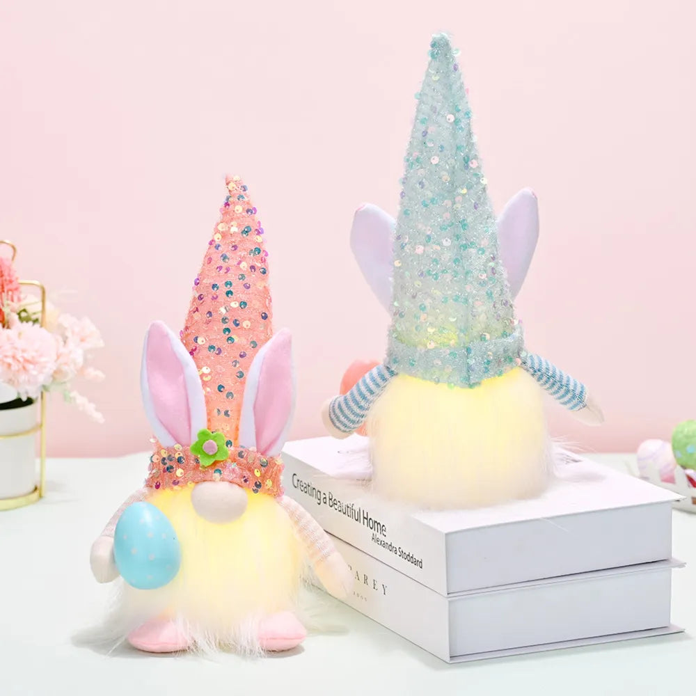 Easter bunny gnome with sequin cone hat and bunny ears, holding an egg.