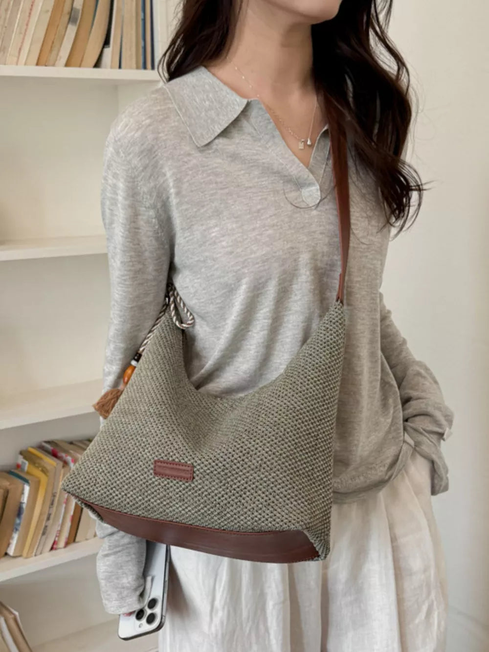 Tassel Woven Shoulder Bag in Sky Blue, model styling view