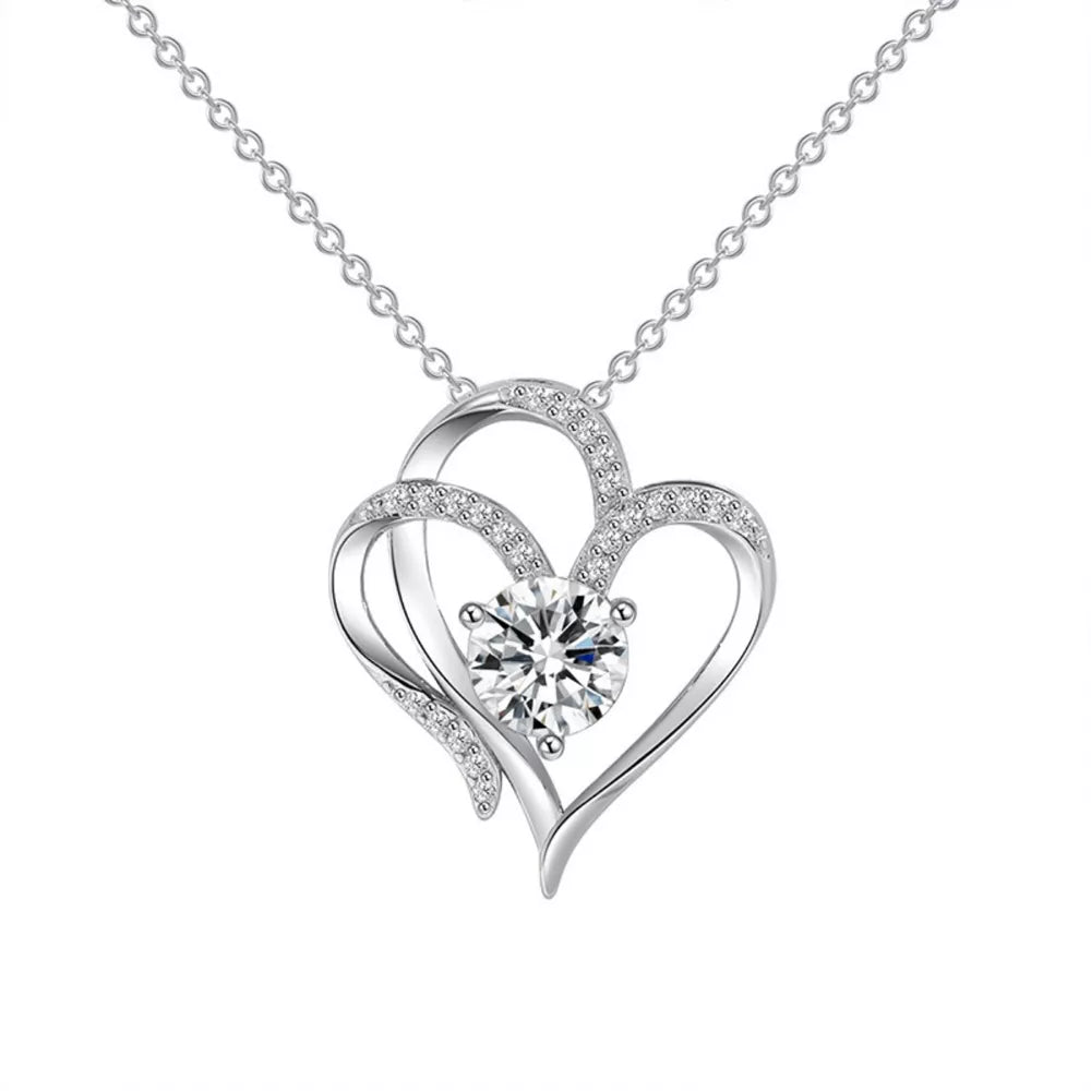 Elegant sterling silver necklace with a double heart pendant and a sparkling center stone.