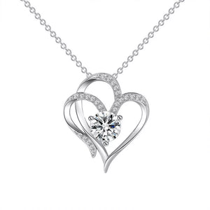 Elegant sterling silver necklace with a double heart pendant and a sparkling center stone.
