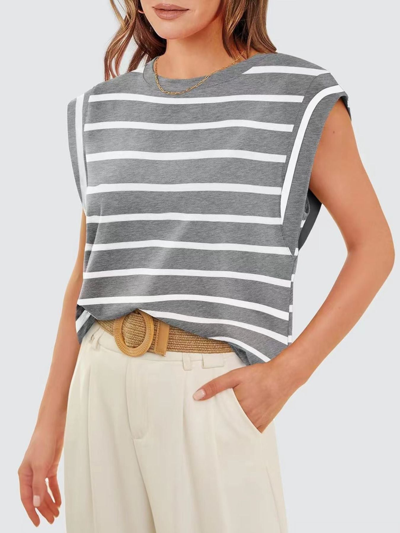 Gray and white striped sleeveless tank top with a round neckline and shoulder detail.