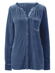 Dusty blue velvet blouse with gathered yoke, V-neck, button front, and chest pocket.