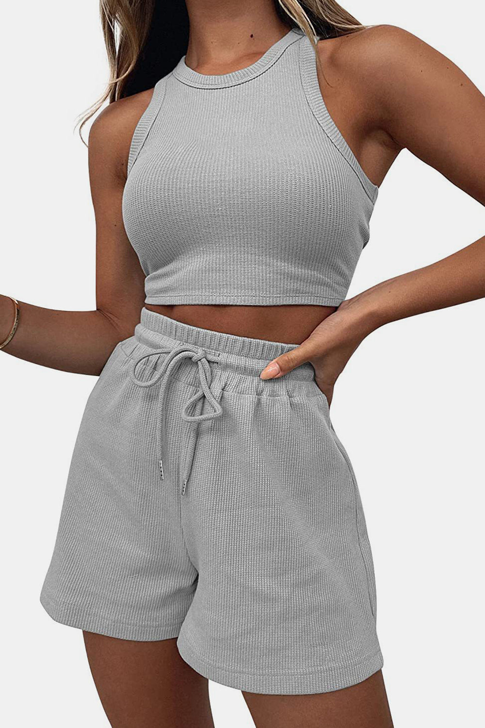 Light gray ribbed knit crop top and drawstring shorts set with racerback detail.