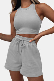 Light gray ribbed knit crop top and drawstring shorts set with racerback detail.