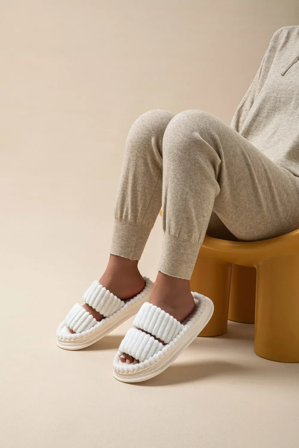 White ribbed terrycloth platform slides with double straps.