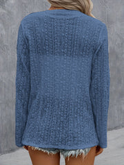 Dusty Blue open-weave long sleeve cardigan with intricate patterned knit detail.