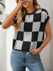 Checkerboard knit cap sleeve top in black and white, casual crewneck sweater.
