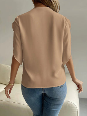 Khaki cape sleeve blouse with lace trim detail, 100% polyester.