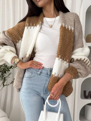 Open front cardigan with balloon sleeves in brown, white, and beige stripes.