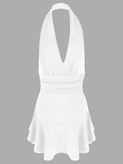 White halter dress with plunging V-neck and ruffle hem