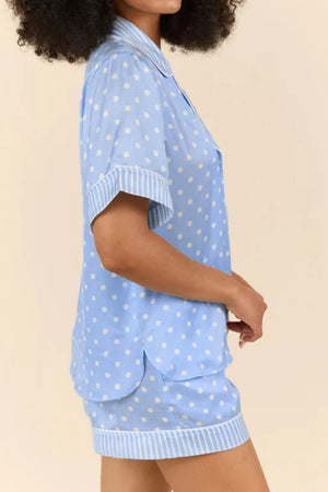 Blue polka dot viscose pajama set with striped trim and button-down top.