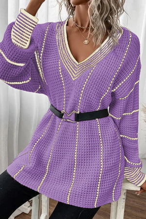 Lavender knit oversized V-neck dress with cream trim and vertical stripe details.