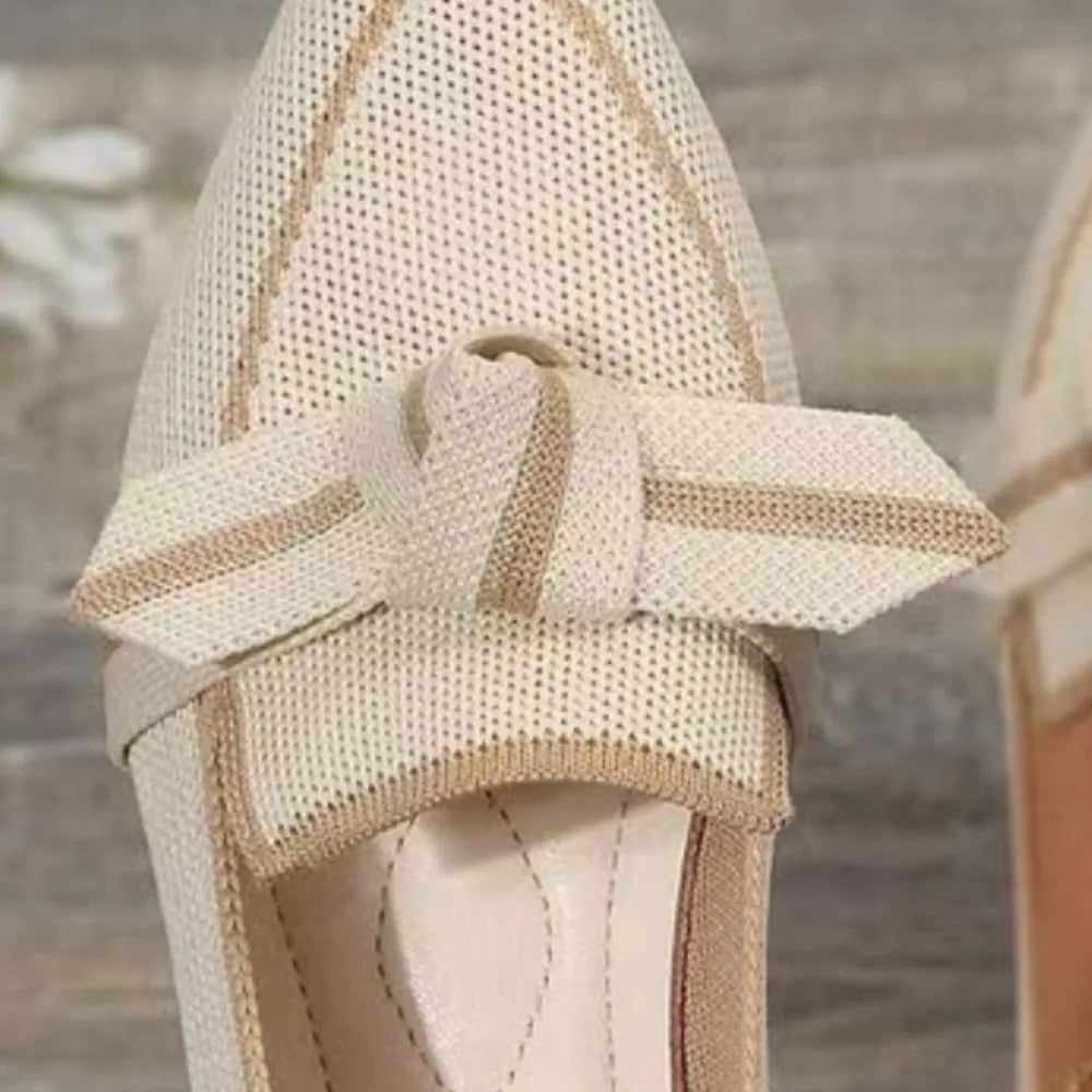 Knit bow loafers in ivory with contrast trim and bow detail.