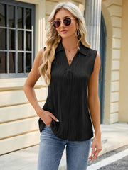 Black textured collared sleeveless blouse with a V-neck and subtle pleating.