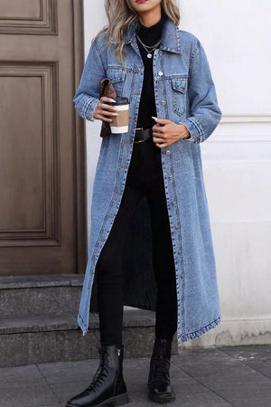 Longline blue denim jacket with pockets, full button front, and collared neckline.