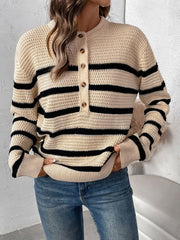 Tan waffle knit henley sweater with black stripes and button detail.
