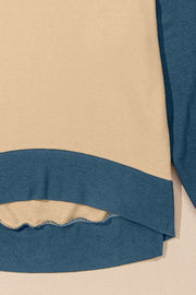 Chic Contrast Crewneck Sweatshirt in tan and blue with a curved hem detail.