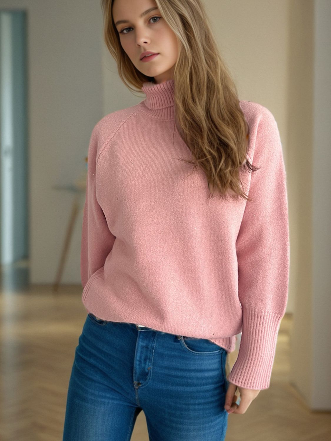 Dusty pink ribbed turtleneck sweater with ribbed cuffs and hem.