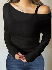 Black sheer long sleeve t-shirt with boat neck and off-the-shoulder styling.
