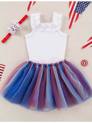 Baby tutu dress with ruffled neckline and red, white, and blue star-spangled tulle skirt.