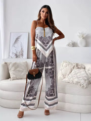 Chic printed cami and wide-leg pants set in a black and white paisley pattern.