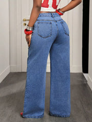 Asymmetrical High-waisted Wide-leg Jeans in Medium Blue, model styling view