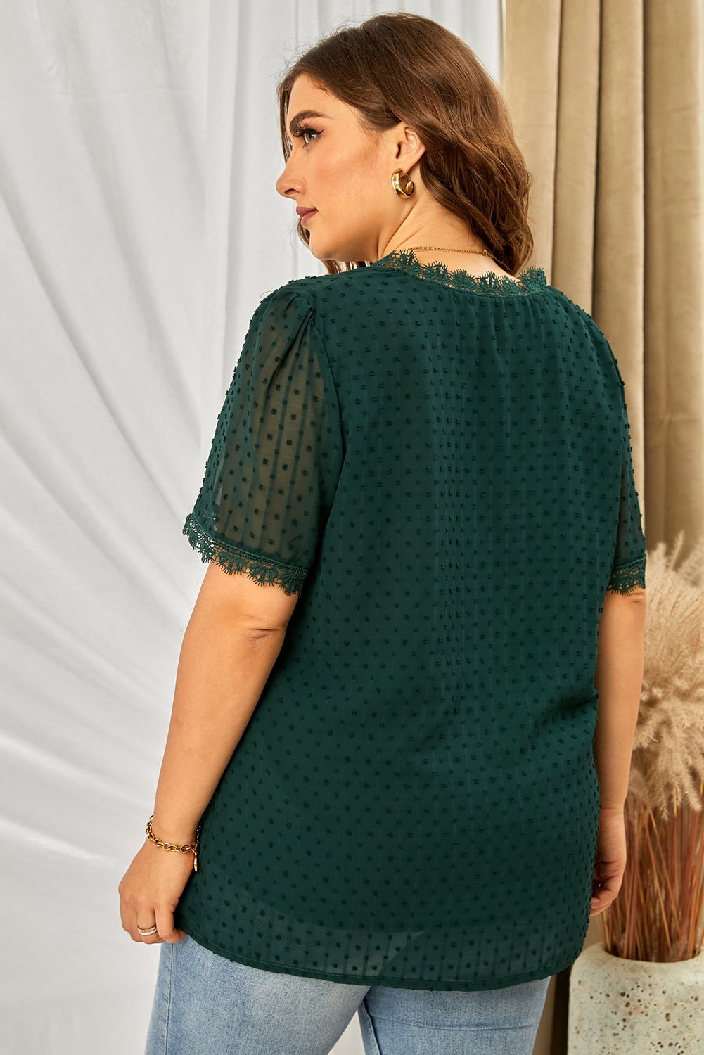 Dark green textured dot blouse with lace trim neckline and sleeves
