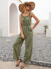 Matcha green textured wide-leg jumpsuit with ruffled straps and elastic waist.