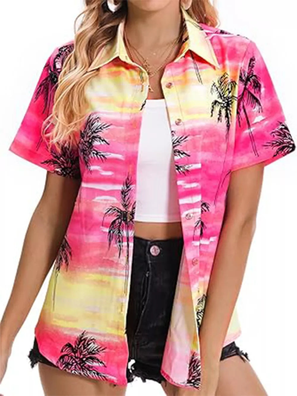 Tropical hibiscus print button-up shirt in pink and yellow with palm trees.