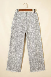 Chic high-waisted leopard print jeans in grey with frayed hem.