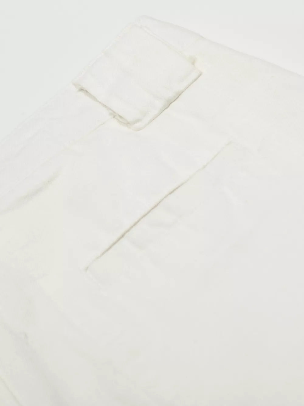 White men's capris with wide leg and visible pocket detail.