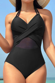 Black crossover halter swimsuit with mesh inset detail