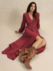 Burgundy maxi dress with balloon sleeves, lace detail, and button front.