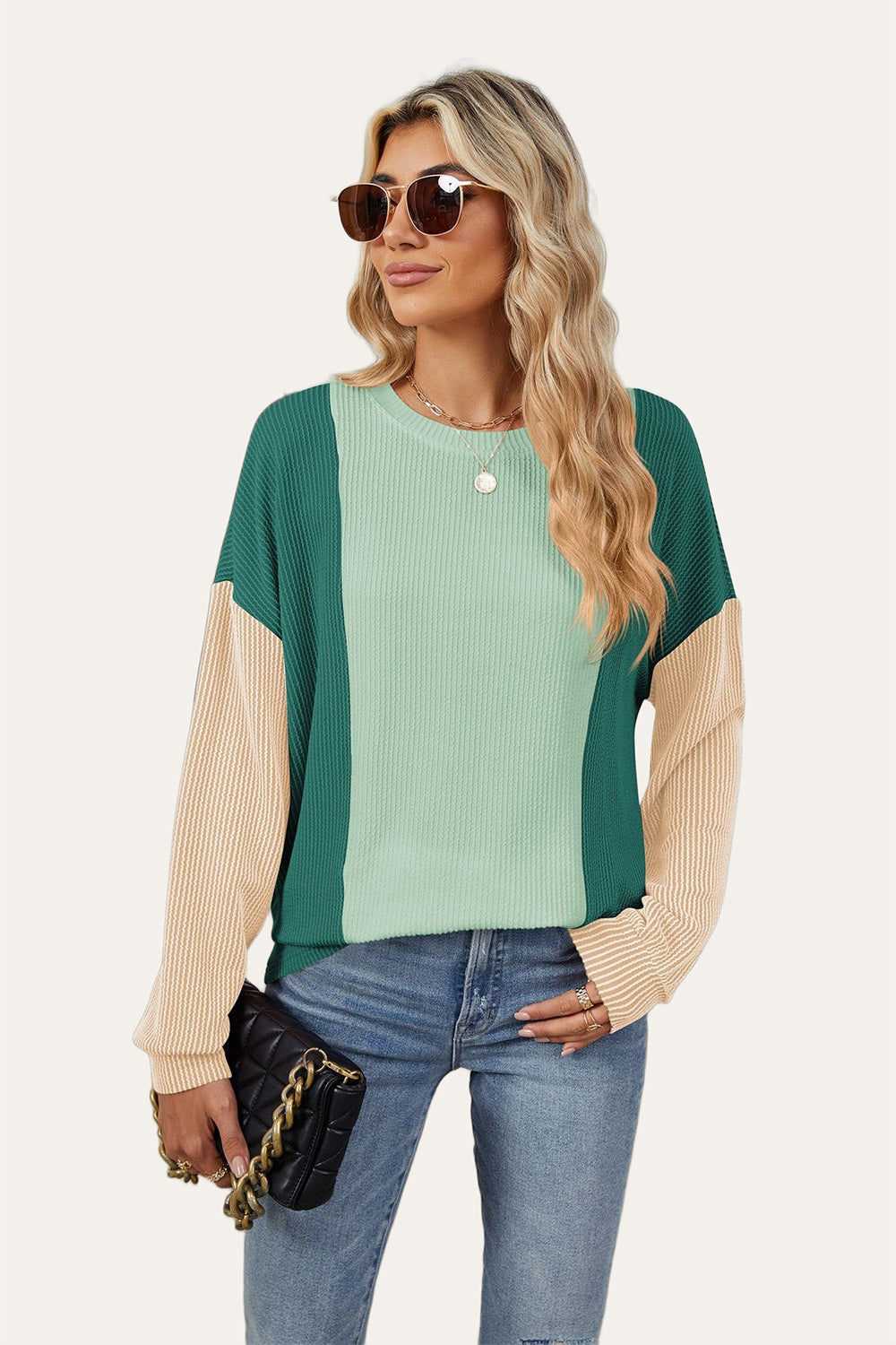 Colorblock waffle knit pullover sweater in green, mint, and tan with crew neck and long sleeves.