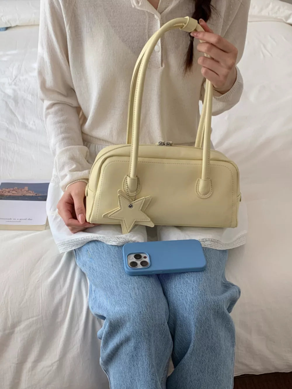 Chic Star Charm Mini Shoulder Bag in yellow with a star charm and double handles.