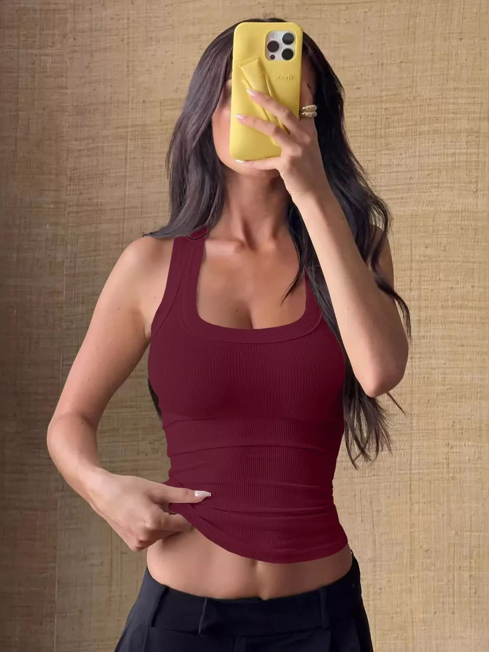 Burgundy ribbed knit cropped tank top with square neckline.
