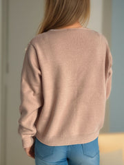 Dusty Pink ribbed knit cardigan with a button-up front, acrylic material.
