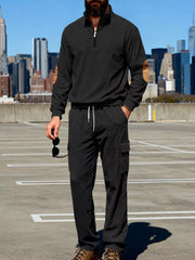 Black casual two-piece set with quarter zip pullover and cargo pants, featuring elbow patches.