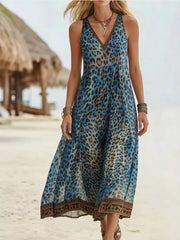 Vibrant leopard print midi dress with V-neck and border detail in dusty blue.