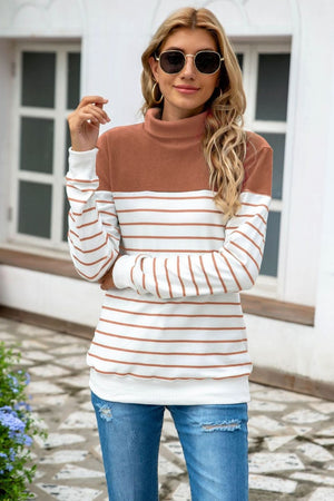 Colorblock stripe turtleneck knit sweater with brown and white stripes, acrylic material.