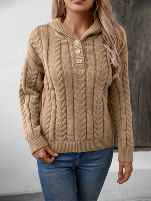 Camel cable knit hooded sweater with button placket and ribbed trim.