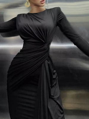 Black ruched long sleeve maxi dress with a boat neckline and bodycon fit.