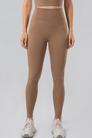 Camel high-waist performance leggings with a seamless contour fit.