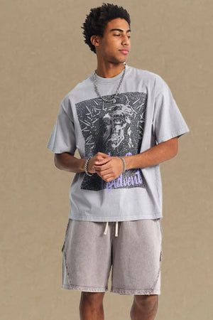 Gray oversized graphic tee with a distressed print and crew neck.