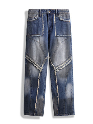 Rugged frayed hem wide leg jeans in blue denim with patchwork details and distressed accents.